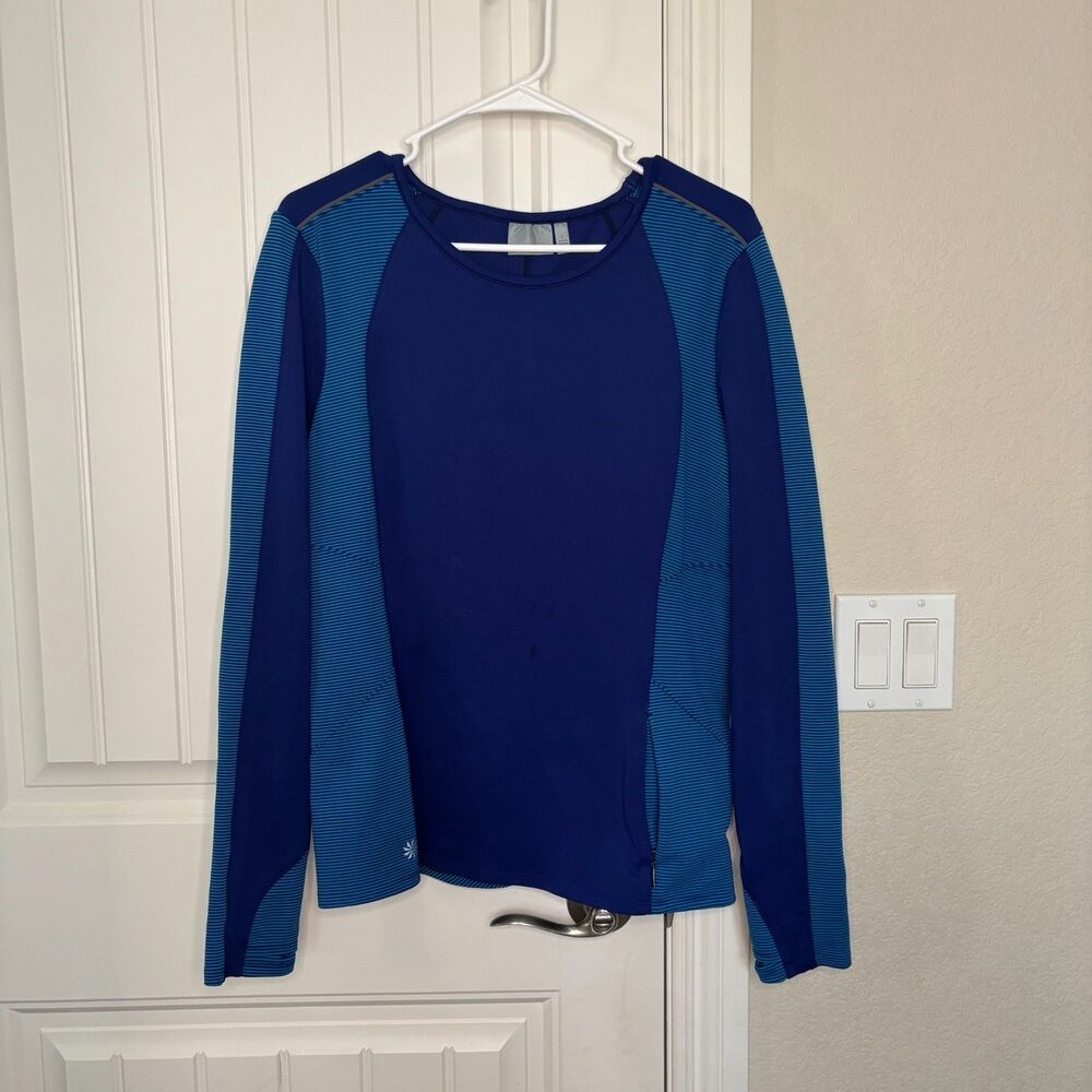 Athleta womens long sleeve athletic top w/stripe side panels sze L (w/stain)